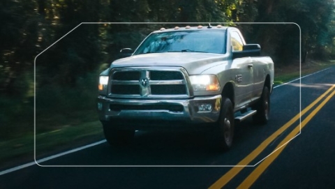 Ram truck driving on road