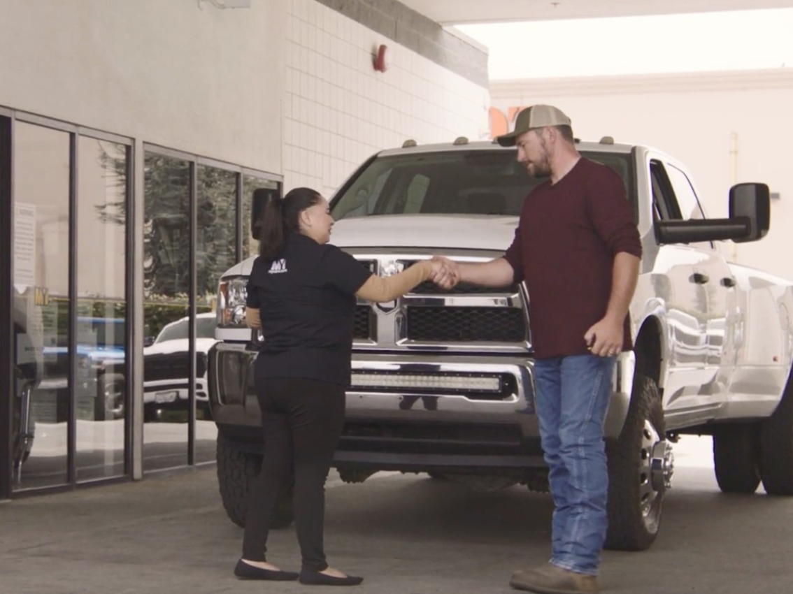 Tyler getting his keys back from dealership